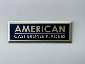 Flash bronze aluminum plaque with a bronze-colored finish for indoor display