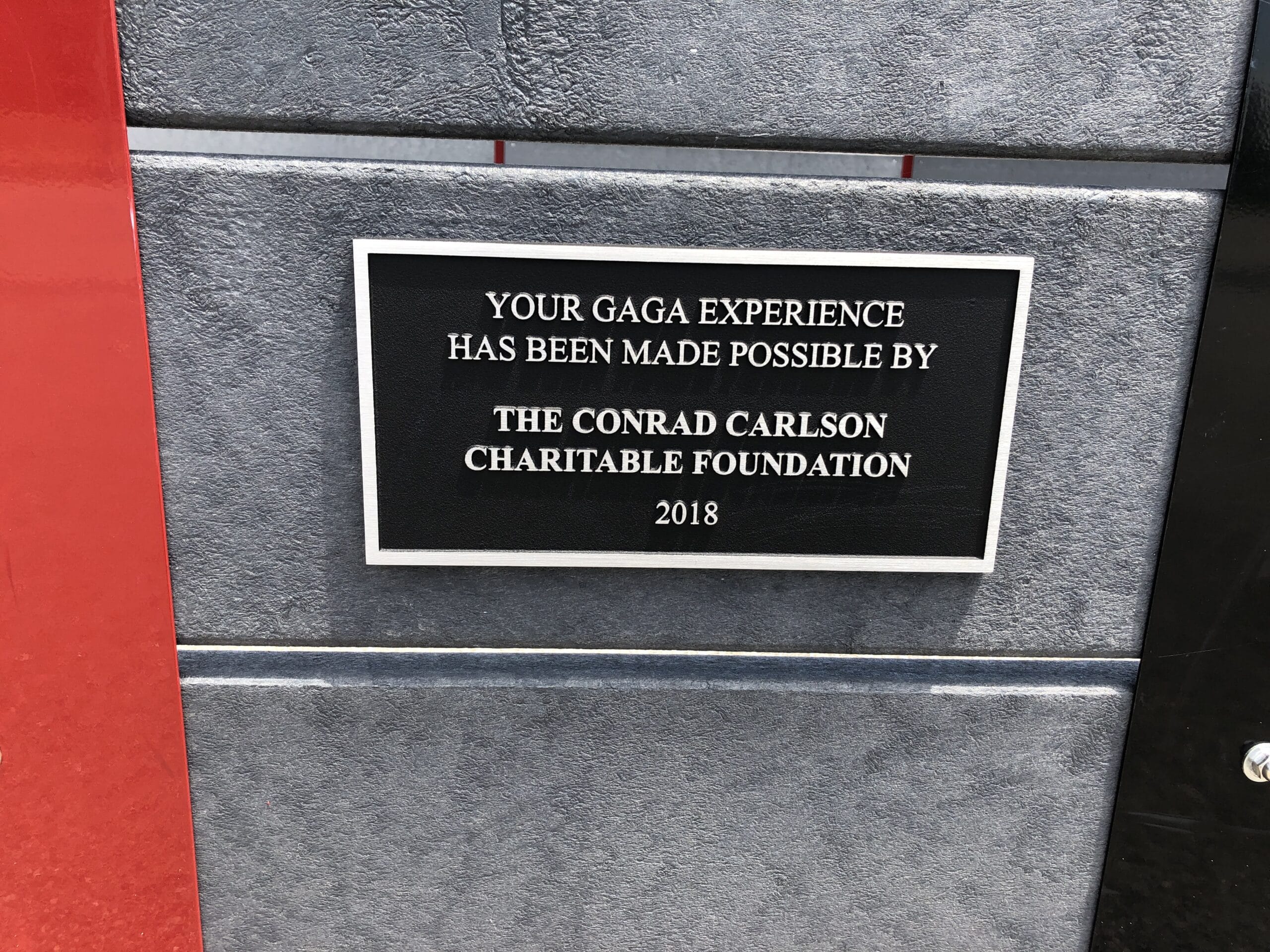 Cast aluminum donor recognition plaque on the Osage City Elementary School Gaga Pit