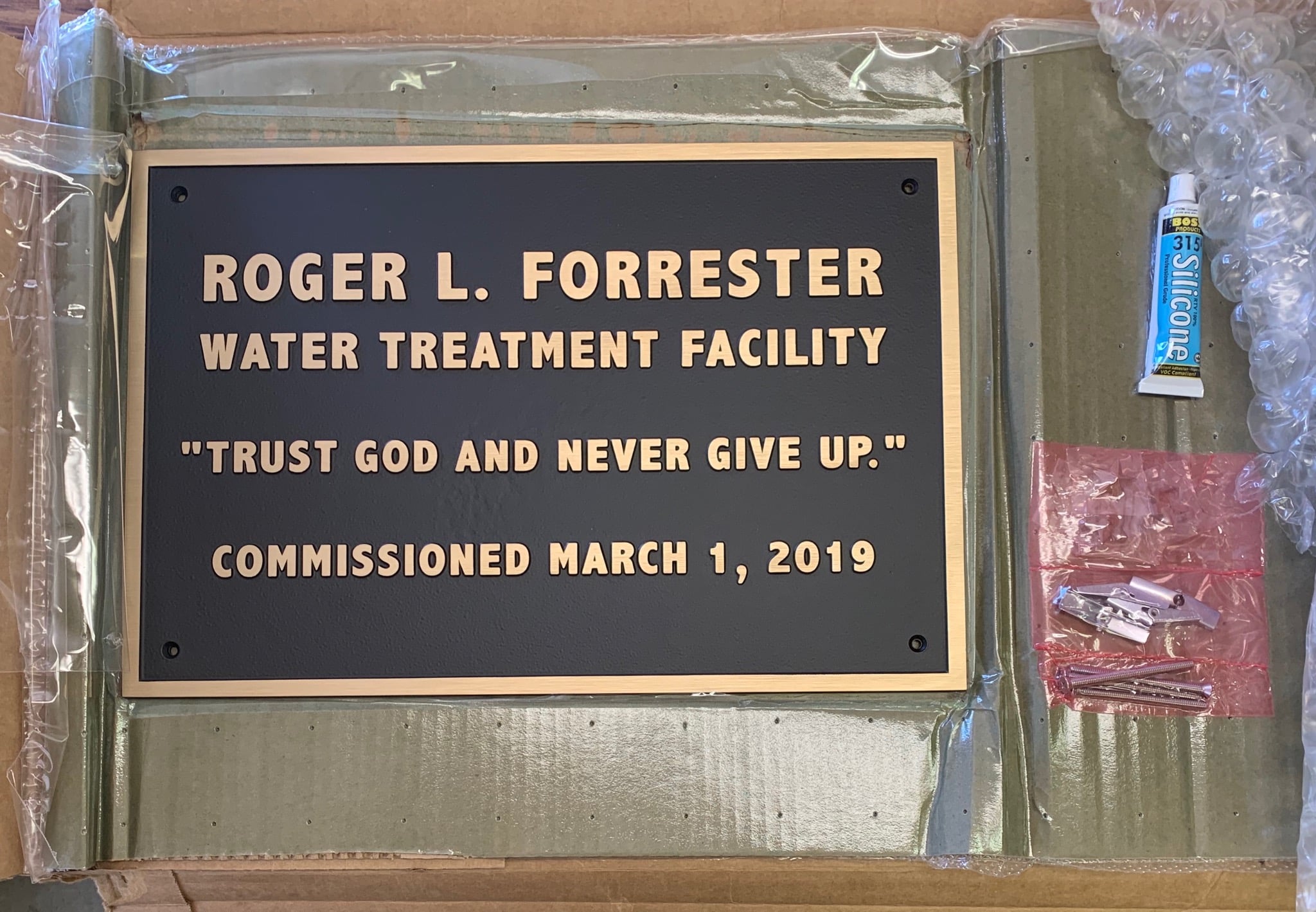 The Roger L Forrester plaque on arrival