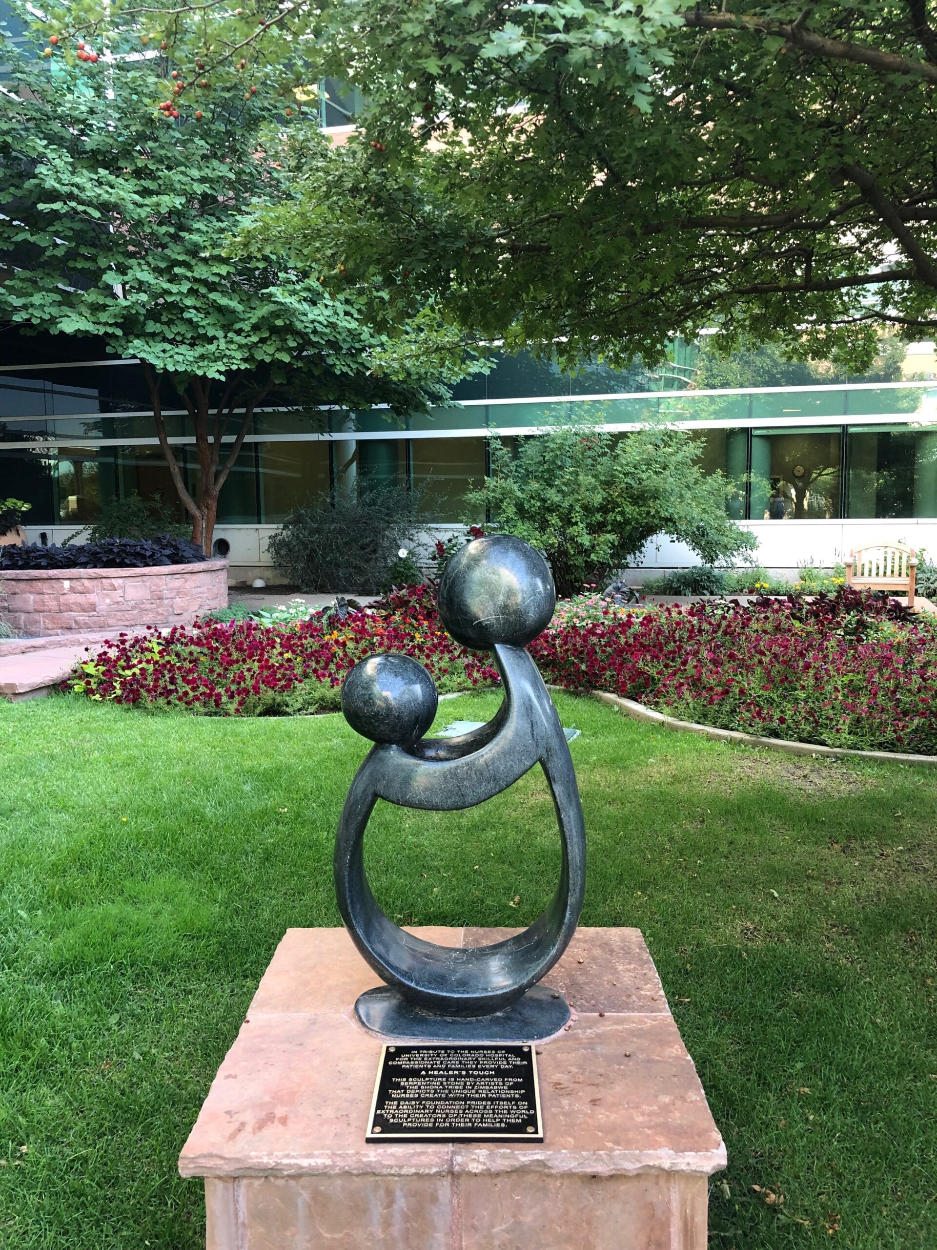 Bronze sculpture and dedication plaque at University of Colorado Hospital