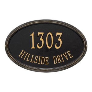 Oval-shaped address plaque displaying '1303 HILLSIDE DRIVE' in gold lettering on a black background.