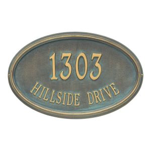Bronze address plaque displaying the numbers '1303' and the text 'HILLSIDE DRIVE' in an oval shape.