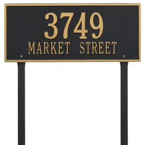 Black address sign with gold lettering displaying the number 3749 and the text Market Street.