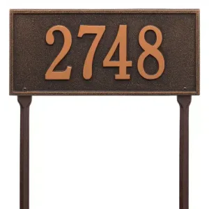 Bronze address plaque displaying the number 2748 in a clear, prominent font.