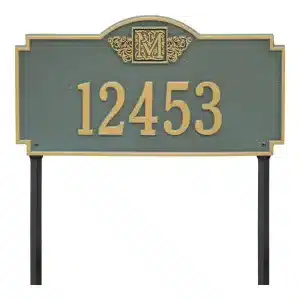 Lawn address sign displaying the number 12453 with a monogram E at the top.