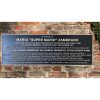 Bronze plaque dedicated to Mario 'Super Mario' Zambrano for his contributions to the Boys and Girls Club.