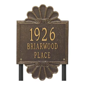 Bronze plaque displaying the address '1926 Briarwood Place' with decorative elements.